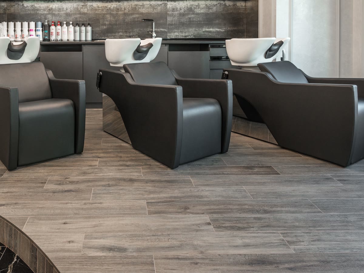 Wash stations at Velvet Fig Studio, three black chairs with white basins